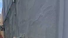 Freshly coated stucco wall with even finish
